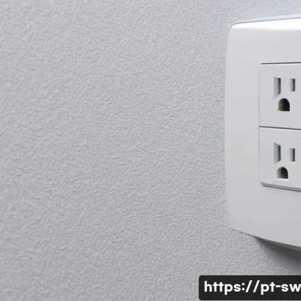 스위스의 전기 콘센트 규격 - A detailed close-up of a Swiss electrical outlet and plug (Type J) showcasing the three round pins w...